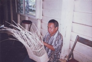 Blind Handicraft Trainer demonstrating Weaving Technique